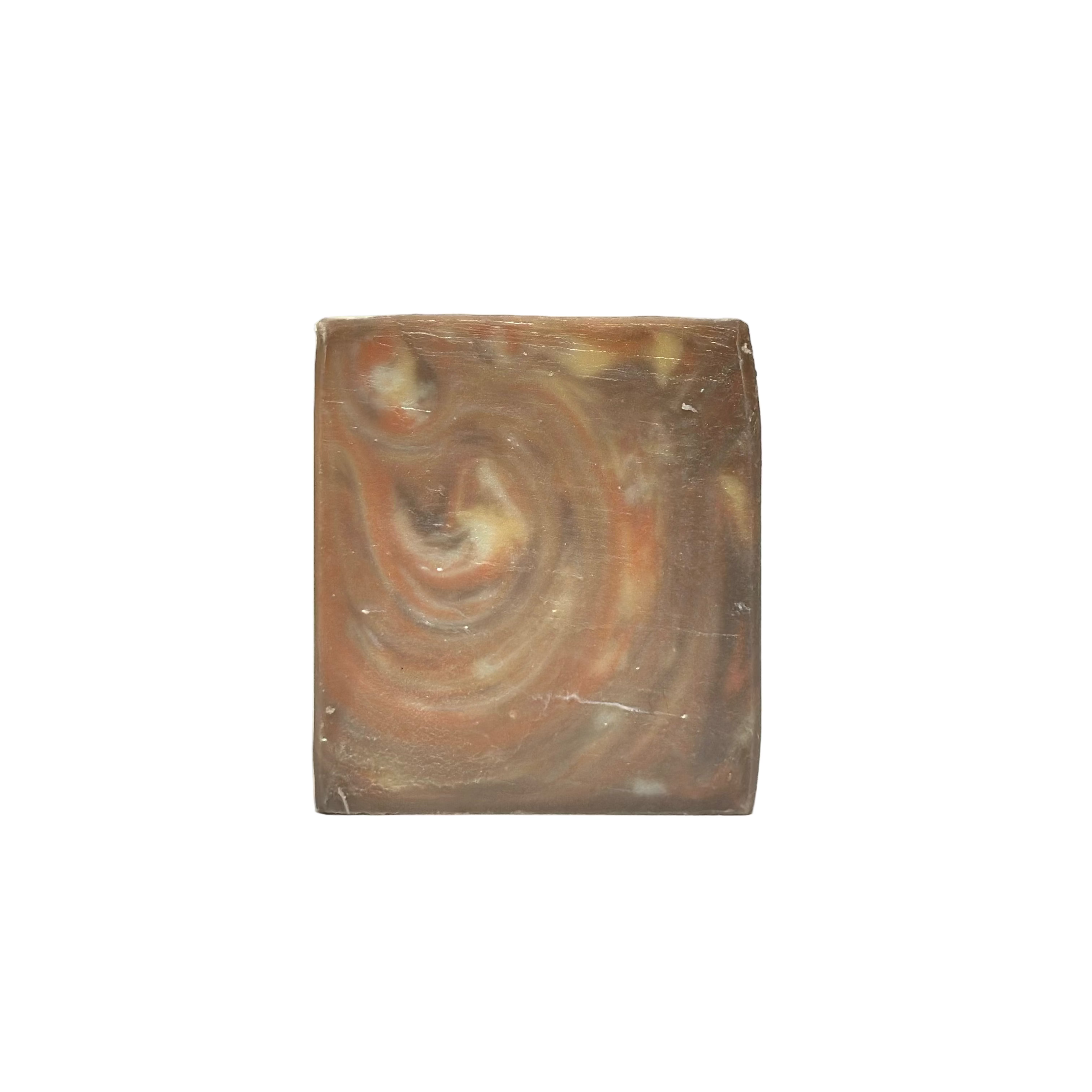 Square soap with swirling pattern on a white background