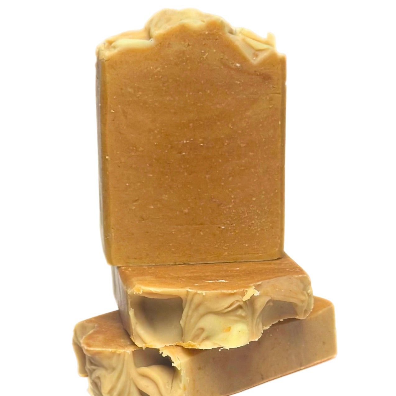 Brown soap bar with a decorative top on a white background